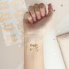 ''TEAM BRIDE'' TEMPORARY TATTOOS ROSE GOLD 16PCS - Image 3
